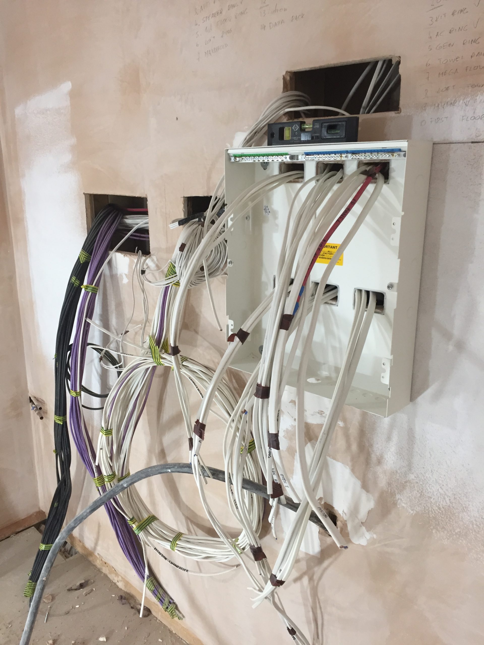 Consumer units and electrical circuits being installed in a new-build house
