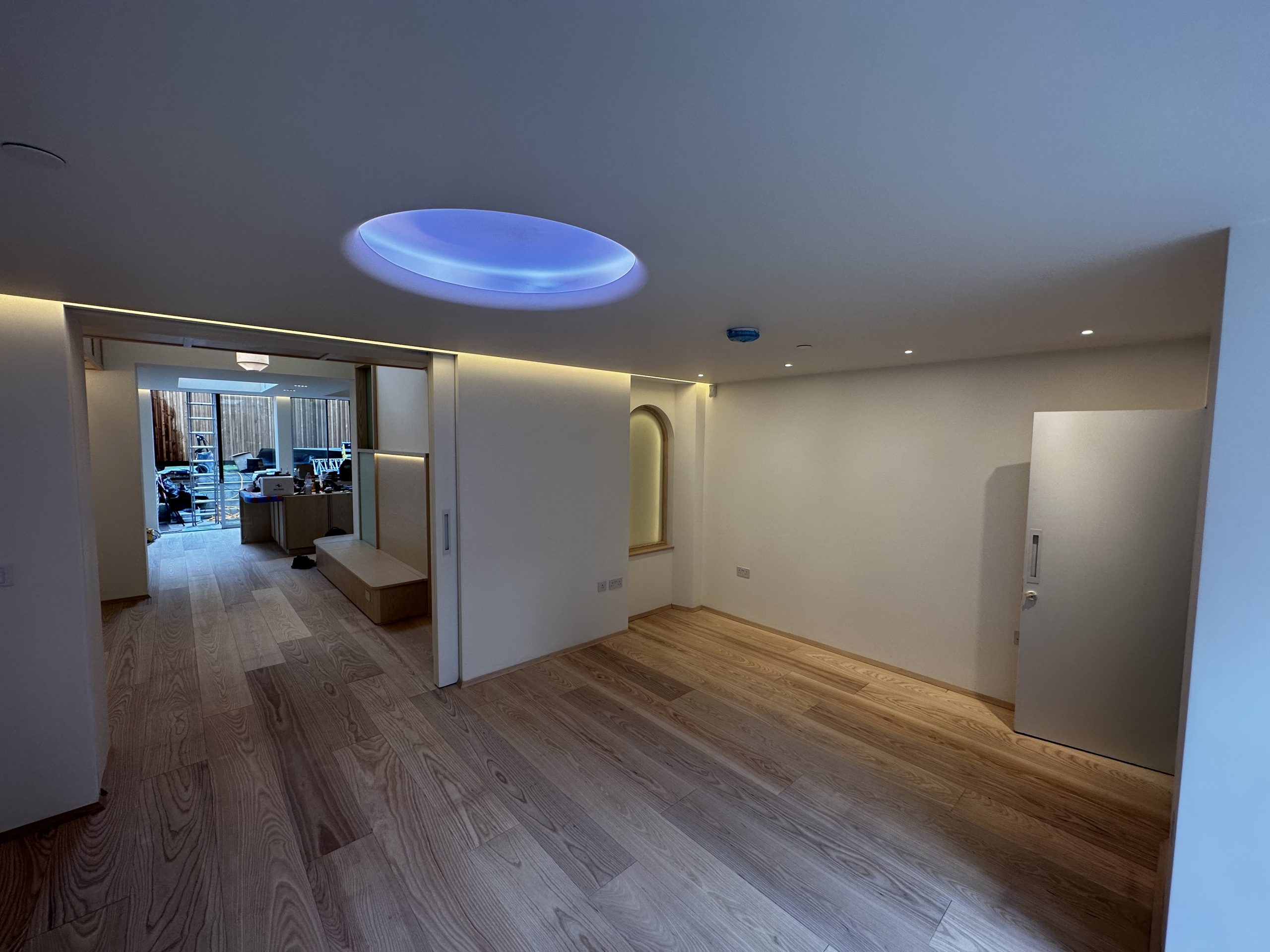 Architectural LED lighting and dimming controls installed in a modern interior