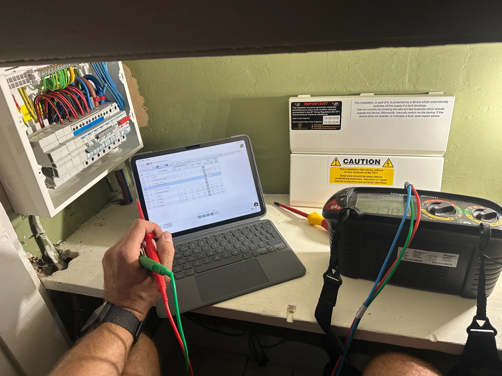 Electrical testing of a consumer unit using professional test equipment and digital records