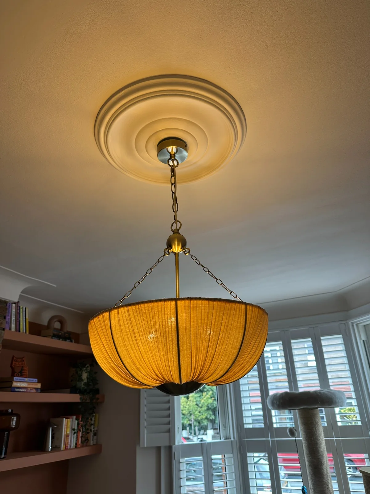 Decorative Pendant Light Installation Decorative pendant light installed beneath a ceiling rose